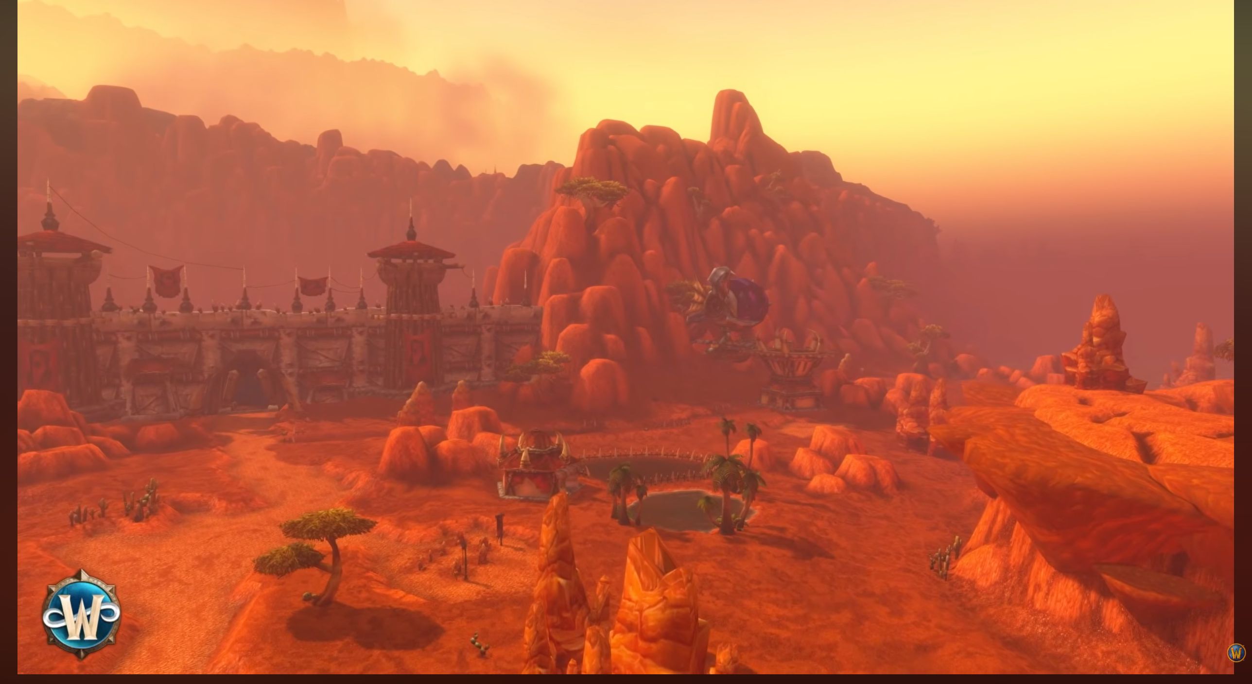 Durotar outside Orgrimmar: in-game view from Blizzard’s graphics panel, showing distant terrain and atmospheric haze. A preview, not a performance benchmark.